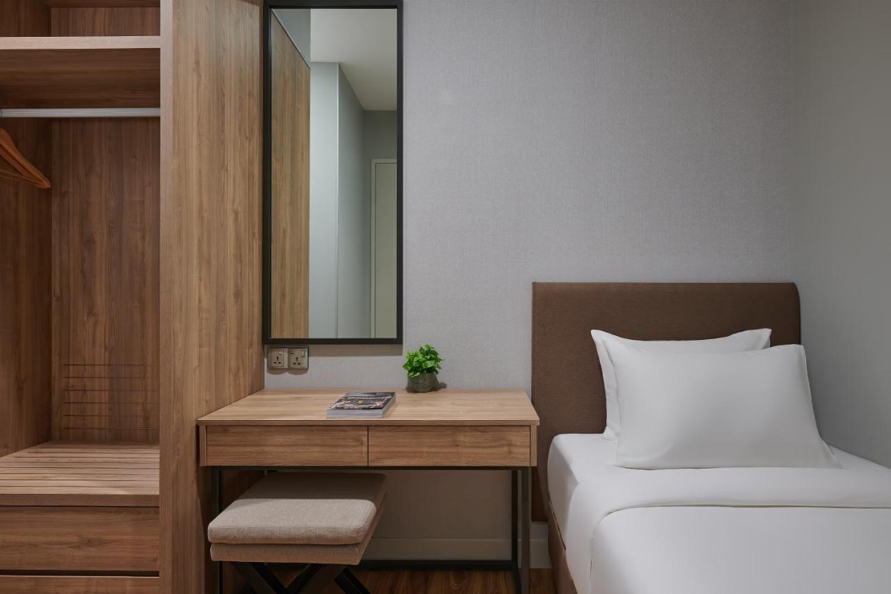 Mercure Living Putrajaya Exteriér fotografie A bedroom at the hotel