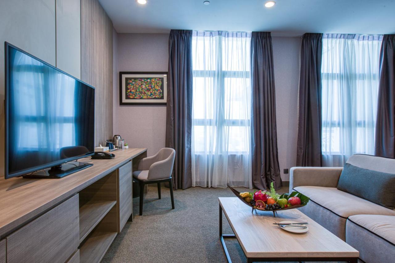 Mercure Living Putrajaya Exteriér fotografie A living room in a serviced apartment in Moscow, Russia